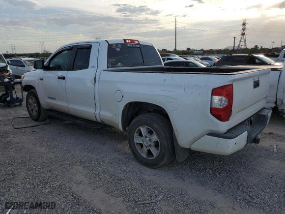 2016 Toyota Tundra 2WD Truck SR5 with VIN 5TFRW5F12GX207090, listed as a Copart auction lot 73683594 with 233,657 mi miles and Salvage Title. Bid and sale history available at carsss.com. Image 2.