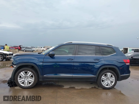2019 Volkswagen Atlas SEL with VIN 1V2ER2CA9KC604299, listed as a IAAI auction lot 42472488 with 62,257 mi miles and . Bid and sale history available at DreamBid. Image 15.