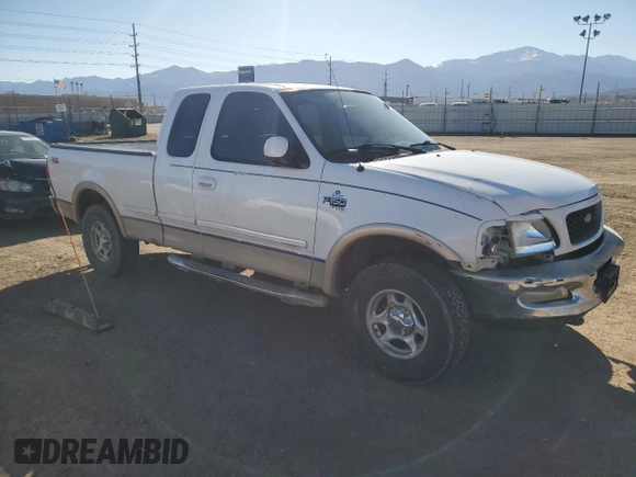 1998 Ford F-150 with VIN 1FTZX18W3WNA25682, listed as a Copart auction lot 47494755 with 197,389 mi miles and Salvage title. Bid and sale history available at DreamBid. Image 4.
