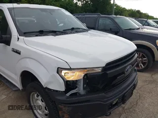 2019 Ford F-150 XL with VIN 1FTFX1E52KKD85150, listed as a IAAI auction lot 42124342 with 122,760 mi miles. Bid and sale history available at carsss.com. Image 6.