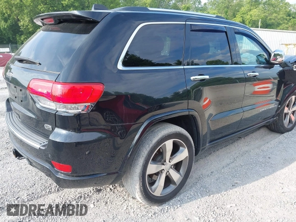 2016 Jeep Grand Cherokee Overland with VIN 1C4RJFCG3GC417699, listed as a IAAI auction lot 42419054 with 109,911 mi miles and . Bid and sale history available at DreamBid. Image 4.