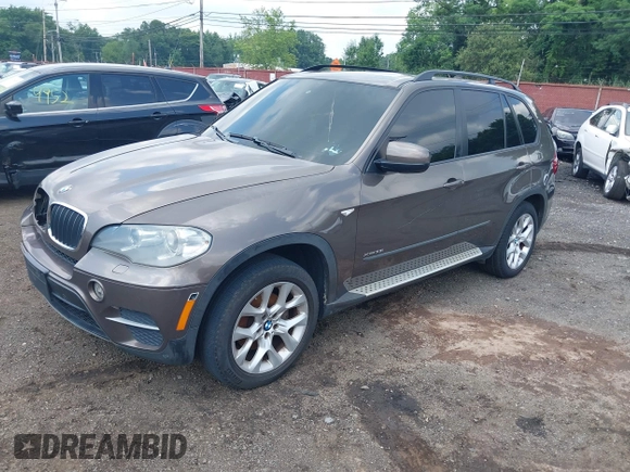 2012 BMW X5 35i with VIN 5UXZV4C59CL766849, listed as a IAAI auction lot 42749836 with 179,273 mi miles and . Bid and sale history available at DreamBid. Image 17.