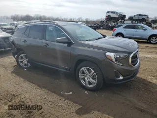 2019 GMC Terrain SLE z VIN 3GKALTEX9KL212960, wystawiony jako Copart lot #49743915 z przebiegiem 93 732 mil mil oraz Czysty tytuł • Clean title. Historia ofert i sprzedaży dostępna na DreamBid. Obrazek 4.