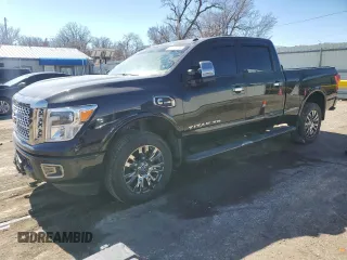 2017 Nissan Titan Pro-4X z VIN 1N6BA1F43HN557633, wystawiony jako Copart lot #46501645 z przebiegiem 94 325 mil mil oraz Szkody całkowita. Historia ofert i sprzedaży dostępna na DreamBid. Obrazek 1.