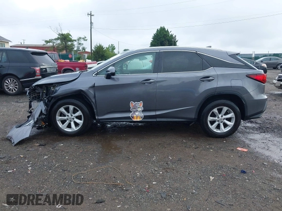 2016 Lexus RX 350 z VIN 2T2BZMCA5GC052214, wystawiony jako IAAI lot #42669843 z przebiegiem 93 891 mil mil oraz . Historia ofert i sprzedaży dostępna na DreamBid. Obrazek 14.