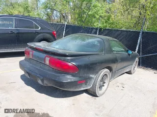 1996 Pontiac Firebird with VIN 2G2FS22K0T2231261, listed as a IAAI auction lot 42088061 with 194,913 mi miles. Bid and sale history available at carsss.com. Image 4.