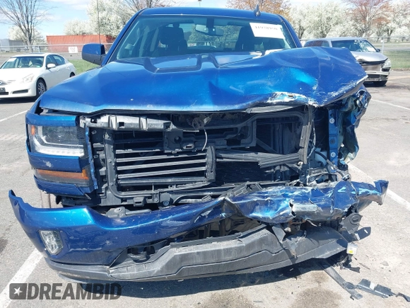 2017 Chevrolet Silverado 1500 LT with VIN 1GCVKREC6HZ312970, listed as a IAAI auction lot 41978950 with 104,239 mi miles and . Bid and sale history available at DreamBid. Image 13.