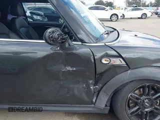 2012 MINI Convertible S with VIN WMWZP3C54CT250689, listed as a IAAI auction lot 41928624 with 126,442 mi miles and . Bid and sale history available at DreamBid. Image 12.