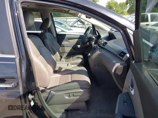 2016 Honda Odyssey EX-L with VIN 5FNRL5H61GB089853, listed as a IAAI auction lot 42019081 with 81,317 mi miles and . Bid and sale history available at DreamBid. Image 5.