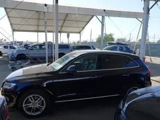 2015 Audi Q5 Premium Plus z VIN WA1LFAFP0FA013351, wystawiony jako IAAI lot #42537653 z przebiegiem 98 842 mil mil oraz . Historia ofert i sprzedaży dostępna na DreamBid. Obrazek 14.