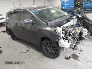 2014 Mazda 5 Sport with VIN JM1CW2BLXE0164748, listed as a IAAI auction lot 42064606 with 140,169 mi miles and . Bid and sale history available at DreamBid. Image 1.