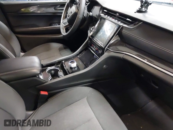 2023 Jeep Grand Cherokee Altitude with VIN 1C4RJHAG8P8709690, listed as a IAAI auction lot 41408724 with 32,972 mi miles and . Bid and sale history available at DreamBid. Image 5.