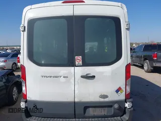 2015 Ford Transit Cargo with VIN 1FTNE2CMXFKA15572, listed as a IAAI auction lot 41566311 with 276,750 mi miles and . Bid and sale history available at carsss.com. Image 16.