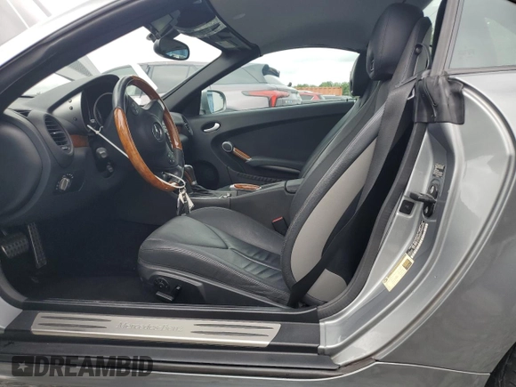 2010 Mercedes-Benz SLK with VIN WDBWK5JA7AF228325, listed as a Copart auction lot 55966235 with 41,728 mi miles and Salvage title. Bid and sale history available at DreamBid. Image 7.