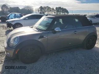 2011 MINI Convertible with VIN WMWZN3C53BT133576, listed as a Copart auction lot 87543835 with 69,999 mi miles and Salvage Title. Bid and sale history available at DreamBid. Image 1.