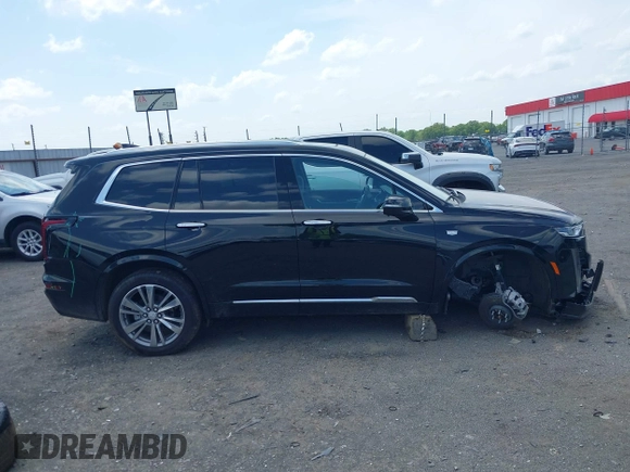 2025 Cadillac XT6 AWD Premium Luxury with VIN 1GYKPDRS3SZ118214, listed as a IAAI auction lot 42100315 with 12,795 mi miles and . Bid and sale history available at DreamBid. Image 14.