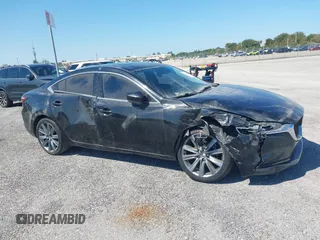 2020 Mazda 6 Touring with VIN JM1GL1VMXL1517828, listed as a IAAI auction lot 41511804 with 123,174 mi miles. Bid and sale history available at carsss.com. Image 6.