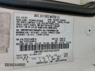 2005 Mercury Grand Marquis GS with VIN 2MEFM74W55X654070, listed as a Copart auction lot 53114785 with 56,128 mi miles and Salvage Title. Bid and sale history available at DreamBid. Image 14.