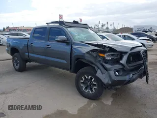 2023 Toyota Tacoma SR5 z VIN 3TMDZ5BN3PM143867, wystawiony jako IAAI lot #42033434 z przebiegiem 32 498 mil mil oraz . Historia ofert i sprzedaży dostępna na DreamBid. Obrazek 1.