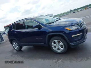 2018 Jeep Compass Latitude with VIN 3C4NJDBB2JT150463, listed as a IAAI auction lot 42452301 with 73,895 mi miles and . Bid and sale history available at DreamBid. Image 13.