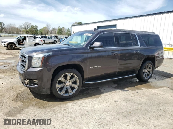 2015 GMC Yukon XL SLT with VIN 1GKS1HKC8FR551491, listed as a Copart auction lot 49183575 with 226,565 mi miles and Salvage Title. Bid and sale history available at carsss.com. Image 1.