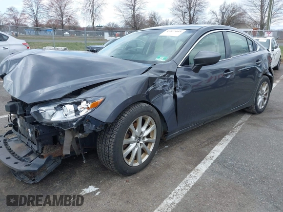 2014 Mazda 6 i Sport with VIN JM1GJ1U51E1111018, listed as a IAAI auction lot 41875461 with 253,755 mi miles and . Bid and sale history available at DreamBid. Image 2.