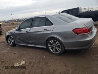 2014 Mercedes-Benz E 350 Sport with VIN WDDHF5KB2EA854735, listed as a Copart auction lot 88583415 with 99,456 mi miles and Salvage title. Bid and sale history available at DreamBid. Image 2.