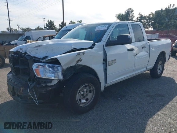 2023 Ram 1500 Tradesman with VIN 1C6RR6FG3PS593993, listed as a IAAI auction lot 41757036 with 28,654 mi miles and . Bid and sale history available at DreamBid. Image 2.