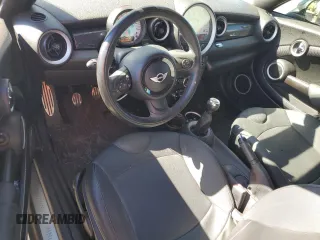 2014 MINI Coupe S z VIN WMWSX3C57ET409158, wystawiony jako Copart lot #81650034 z przebiegiem 118 523 mil mil oraz Szkody całkowita. Historia ofert i sprzedaży dostępna na DreamBid. Obrazek 8.