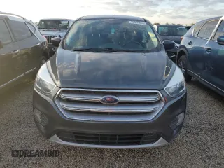 2017 Ford Escape SE z VIN 1FMCU0GDXHUE91333, wystawiony jako Copart lot #82061644 z przebiegiem Nie podano mil oraz Nie do naprawy • Non repairable. Historia ofert i sprzedaży dostępna na DreamBid. Obrazek 5.