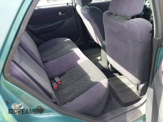 2002 Mazda Protege DX z VIN JM1BJ225721591435, wystawiony jako IAAI lot #42117544 z przebiegiem 191 185 mil mil oraz . Historia ofert i sprzedaży dostępna na DreamBid. Obrazek 8.