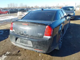 2018 Chrysler 300 with VIN 2C3CCAGG7JH302352, listed as a IAAI auction lot 41626942 with 106,656 mi miles. Bid and sale history available at carsss.com. Image 4.