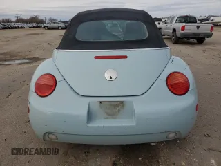 2004 Volkswagen Beetle with VIN 3VWCM21Y64M310431, listed as a Copart auction lot 82449604 with 166,974 mi miles and Salvage Title. Bid and sale history available at DreamBid. Image 6.