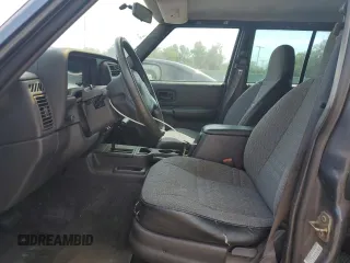 2001 Jeep Cherokee Sport with VIN 1J4FT48S31L596648, listed as a Copart auction lot 54101345 with 190,688 mi miles and Clean title. Bid and sale history available at DreamBid. Image 7.