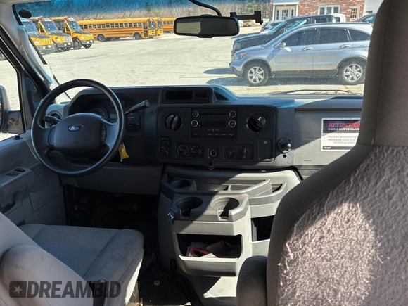 2014 Ford Econoline Passenger XL with VIN 1FBNE3BL1EDA64827, listed as a Copart auction lot 48927855 with 102,965 mi miles and Clean title. Bid and sale history available at DreamBid. Image 7.