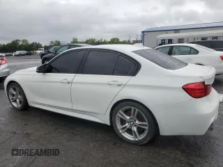 2014 BMW 3 Series 335i xDrive with VIN WBA3B9G51ENR92301, listed as a Copart auction lot 58296885 with 81,988 mi miles and Salvage title. Bid and sale history available at DreamBid. Image 2.