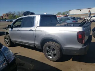 2023 Honda Ridgeline RTL-E with VIN 5FPYK3F77PB059763, listed as a Copart auction lot 54026045 with 34,114 mi miles and Salvage title. Bid and sale history available at DreamBid. Image 2.