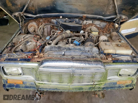 1986 Jeep Grand Wagoneer с VIN 1JCNJ15U5GT147524, выставлен на аукционе Copart как лот 57421255 с пробегом 112 292 миль миль и Списание • Salvage title. История ставок и продаж доступна на DreamBid. Изображение 11.