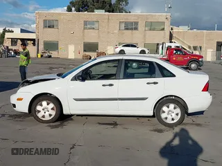 2007 Ford Focus S with VIN 1FAHP34N67W244433, listed as a IAAI auction lot 41539078 with 107,318 mi miles and . Bid and sale history available at DreamBid. Image 14.