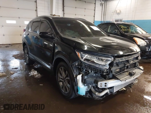 2020 Honda CR-V Touring with VIN 2HKRW2H94LH663650, listed as a IAAI auction lot 41570549 with 29,571 mi miles and . Bid and sale history available at DreamBid. Image 1.