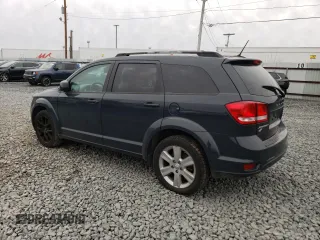 2018 Dodge Journey SXT z VIN 3C4PDDBG8JT390306, wystawiony jako Copart lot #49467735 z przebiegiem 144 012 mil mil oraz Czysty tytuł • Clean title. Historia ofert i sprzedaży dostępna na DreamBid. Obrazek 2.