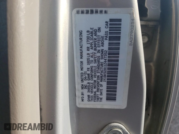 2001 Chevrolet Prizm z VIN 1Y1SK52811Z447352, wystawiony jako Copart lot #73916394 z przebiegiem 89 265 mil mil oraz Szkoda całkowita • Salvage title. Historia ofert i sprzedaży dostępna na DreamBid. Obrazek 12.