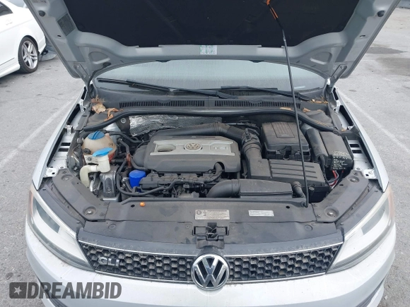 2012 Volkswagen Jetta GLI Autobahn with VIN 3VW4A7AJ1CM450205, listed as a IAAI auction lot 42421504 with 130,602 mi miles and . Bid and sale history available at DreamBid. Image 10.