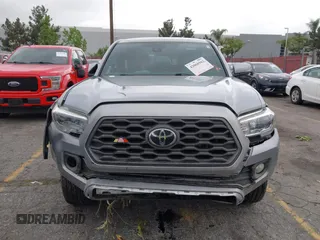 2021 Toyota Tacoma SR z VIN 3TMCZ5AN3MM374132, wystawiony jako IAAI lot #42068562 z przebiegiem 38 654 mil mil oraz . Historia ofert i sprzedaży dostępna na DreamBid. Obrazek 6.