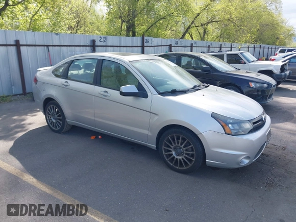 2011 Ford Focus SES with VIN 1FAHP3GN2BW180198, listed as a IAAI auction lot 42121335 with 162,826 mi miles. Bid and sale history available at carsss.com. Image 1.