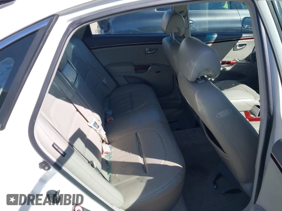 2007 Hyundai Azera SE z VIN KMHFC46F57A210341, wystawiony jako IAAI lot #41729427 z przebiegiem 113 301 mil mil oraz . Historia ofert i sprzedaży dostępna na DreamBid. Obrazek 8.