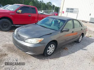 2003 Toyota Camry LE with VIN 4T1BE32K03U727447, listed as a IAAI auction lot 42118785 with 325,881 mi miles and . Bid and sale history available at DreamBid. Image 2.