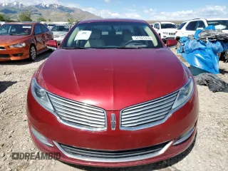 2013 Lincoln MKZ z VIN 3LN6L2G95DR804619, wystawiony jako Copart lot #57101315 z przebiegiem Nie podano mil oraz Szkoda całkowita • Salvage title. Historia ofert i sprzedaży dostępna na DreamBid. Obrazek 5.