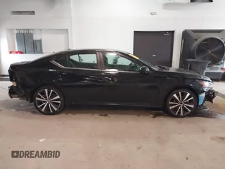 2019 Nissan Altima 2.5 SR with VIN 1N4BL4CV4KC164888, listed as a IAAI auction lot 41712623 with 92,949 mi miles. Bid and sale history available at carsss.com. Image 13.