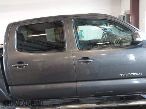 2013 Toyota Tacoma with VIN 3TMLU4EN7DM121253, listed as a IAAI auction lot 42498187 with 145,604 mi miles and . Bid and sale history available at DreamBid. Image 14.